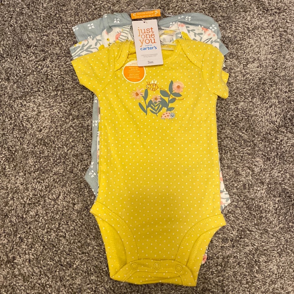 Brand new three piece onsie set for three month old.